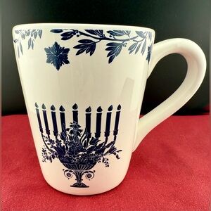 Menorah white ceramic mug with a blue menorah and floral design. 16oz